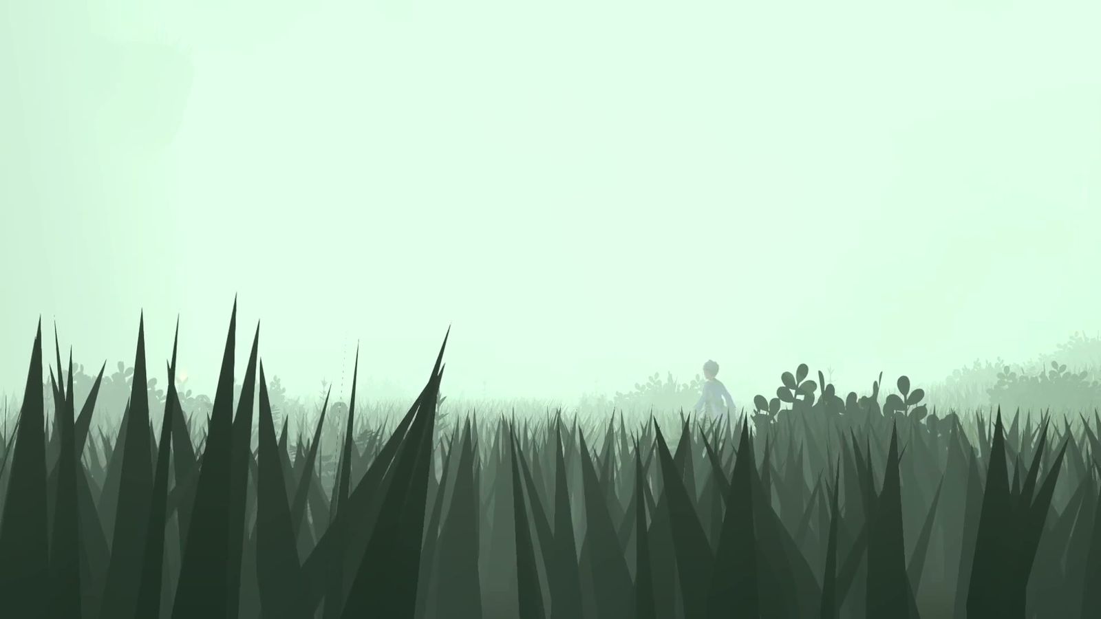 Official trailer frame: tall grass with a figure moving through the distance